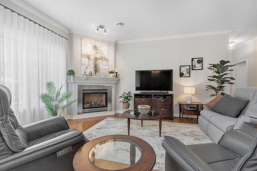 Salon - 203-645 Rue Montmartre, Mascouche, QC - Indoor Photo Showing Living Room With Fireplace