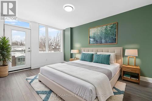 This photo has been virtually staged - 104 Holmwood Avenue, Ottawa, ON - Indoor Photo Showing Bedroom