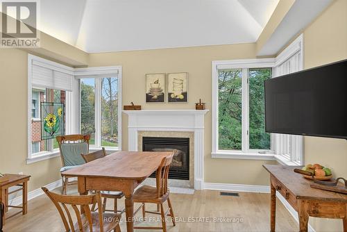 8 - 1121 Armour Road, Peterborough (Ashburnham Ward 4), ON - Indoor Photo Showing Dining Room With Fireplace