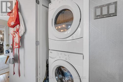 Main floor laundry, behind copper door - 26 - 799 Montreal Road E, Ottawa, ON - Indoor Photo Showing Laundry Room