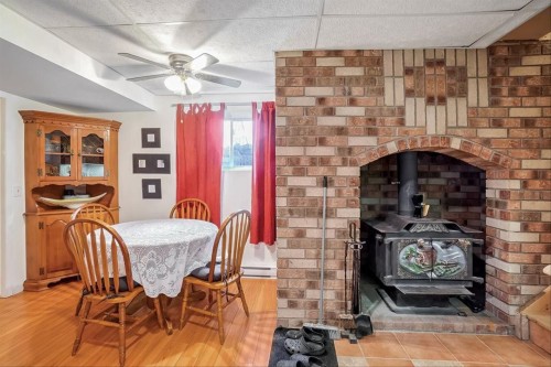 Dwelling - 2326 Ch. Lonsdale E., L'Ange-Gardien, QC - Indoor Photo Showing Dining Room With Fireplace