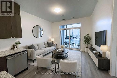 Digitally Staged - 108 - 460 Gordon Krantz Avenue, Milton, ON - Indoor Photo Showing Living Room