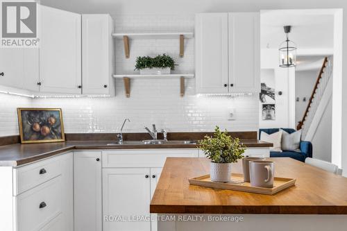 107 Queen Street N, Renfrew, ON - Indoor Photo Showing Kitchen With Double Sink