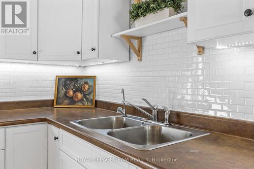 107 Queen Street N, Renfrew, ON - Indoor Photo Showing Kitchen With Double Sink
