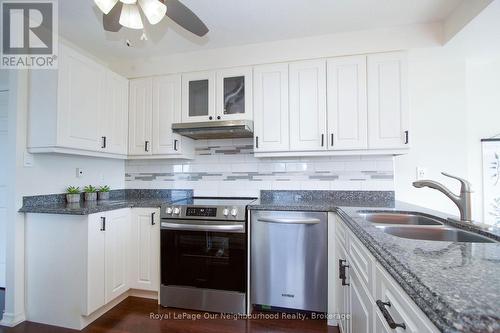 702 - 80 Athol Street E, Oshawa (Central), ON - Indoor Photo Showing Kitchen With Double Sink
