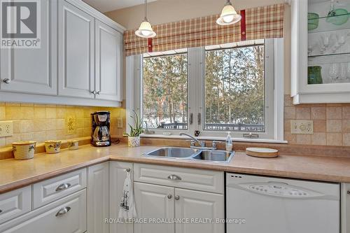 114 O'Carroll Avenue, Peterborough (Northcrest Ward 5), ON - Indoor Photo Showing Kitchen With Double Sink