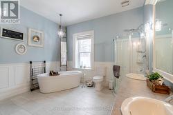 5 Piece bathroom and main floor laundry - 