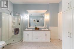 Double sink vanity and standing shower - 