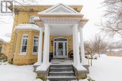 Covered grand front entry way - 