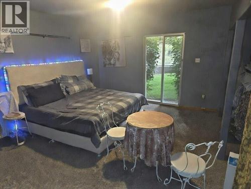 Second House - 1381 3B Highway, Warfield, BC - Indoor Photo Showing Bedroom