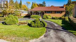 Circular driveway plus carport parking - 