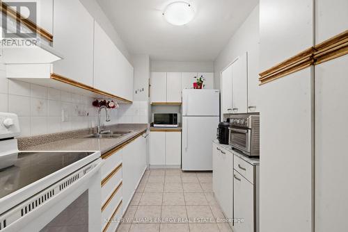 1514 - 1 Massey Square, Toronto (Crescent Town), ON - Indoor Photo Showing Kitchen With Double Sink