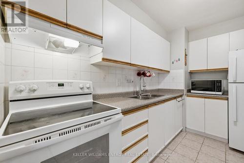 1514 - 1 Massey Square, Toronto (Crescent Town), ON - Indoor Photo Showing Kitchen With Double Sink