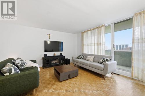 1514 - 1 Massey Square, Toronto (Crescent Town), ON - Indoor Photo Showing Living Room With Fireplace