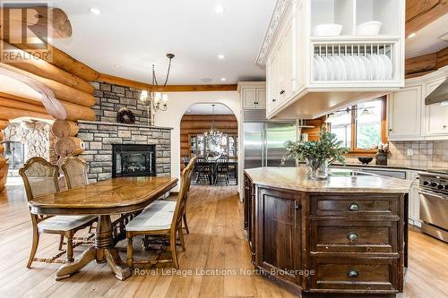 100 Melissa Lane, Tiny, ON - Indoor Photo Showing Other Room With Fireplace