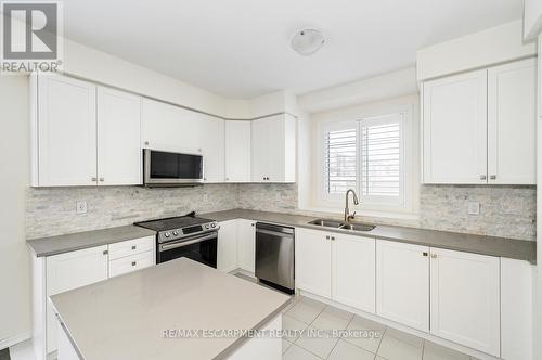 3923 Koenig Road, Burlington, ON - Indoor Photo Showing Kitchen With Double Sink