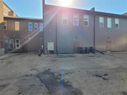 rear view with staff parking area - 287 Hamilton Street, Neepawa, MB 
