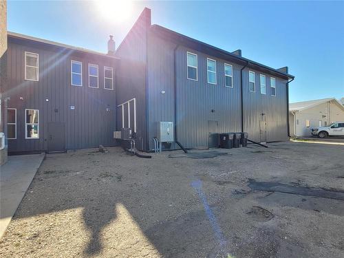 rear view with staff parking area - 287 Hamilton Street, Neepawa, MB 