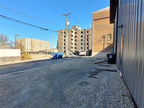 rear view with staff parking area - 287 Hamilton Street, Neepawa, MB 
