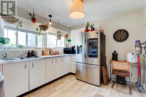 1264 Limberlost Road, London North, ON - Indoor Photo Showing Kitchen With Double Sink