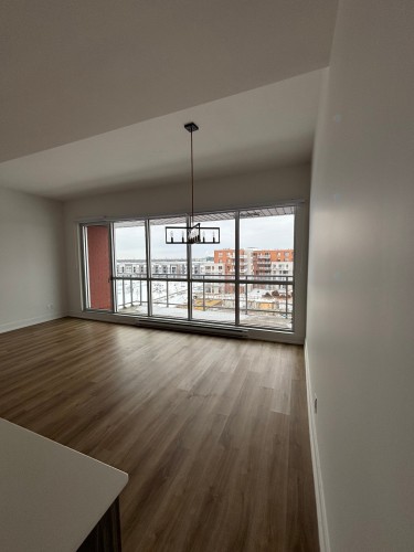 Salon - 502-50 Rue D'Ambre, Candiac, QC - Indoor Photo Showing Other Room