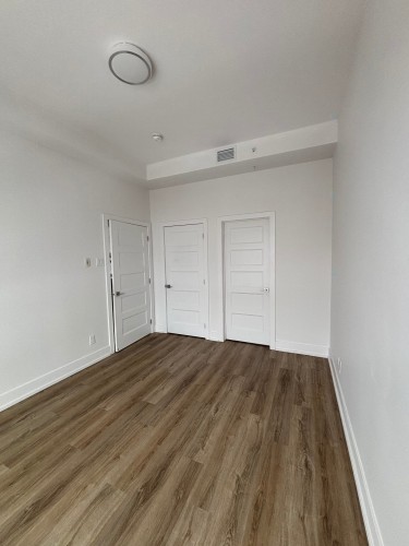 Chambre à coucher principale - 502-50 Rue D'Ambre, Candiac, QC - Indoor Photo Showing Other Room