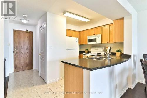 1802 - 4879 Kimbermount Avenue, Mississauga, ON - Indoor Photo Showing Kitchen With Double Sink