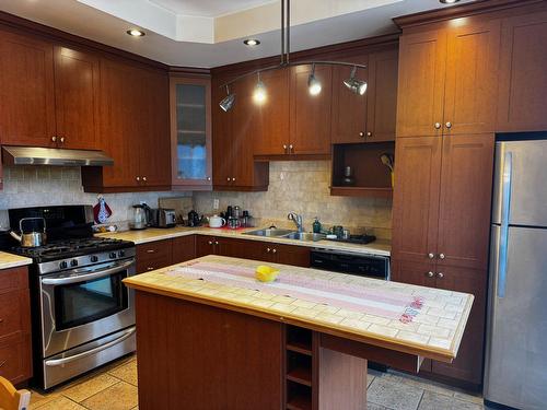 Kitchen - 7844 Rue Lemelin, Brossard, QC - Indoor Photo Showing Kitchen With Double Sink