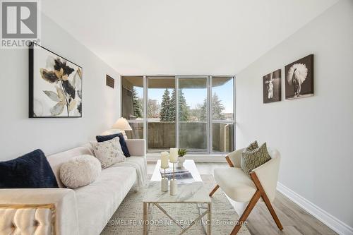 212 - 30 Thunder Grove, Toronto, ON - Indoor Photo Showing Living Room
