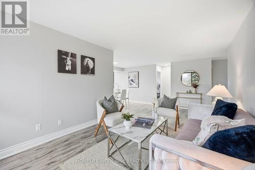 212 - 30 Thunder Grove, Toronto, ON - Indoor Photo Showing Living Room