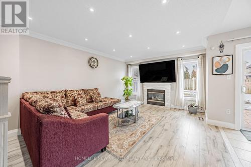 7 Batt Crescent S, Ajax, ON - Indoor Photo Showing Living Room With Fireplace