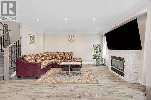 7 Batt Crescent S, Ajax, ON - Indoor Photo Showing Living Room With Fireplace