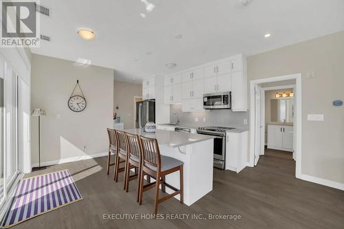 208 - 3265 Carding Mill Trail, Oakville, ON - Indoor Photo Showing Kitchen With Stainless Steel Kitchen With Upgraded Kitchen