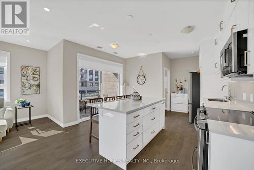208 - 3265 Carding Mill Trail, Oakville, ON - Indoor Photo Showing Kitchen
