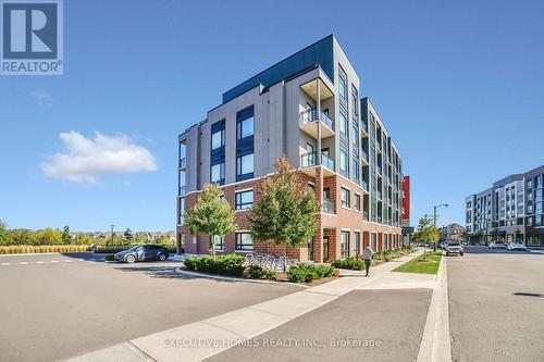 208 - 3265 Carding Mill Trail, Oakville, ON - Outdoor With Facade