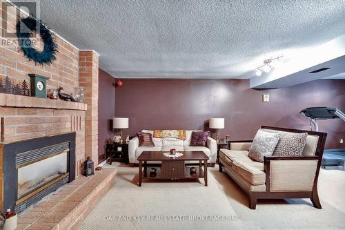 63 Dundee Court, London South (South G), ON - Indoor Photo Showing Living Room With Fireplace