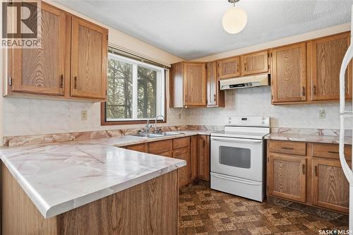 986 Garry Street N, Regina, SK - Indoor Photo Showing Kitchen With Double Sink