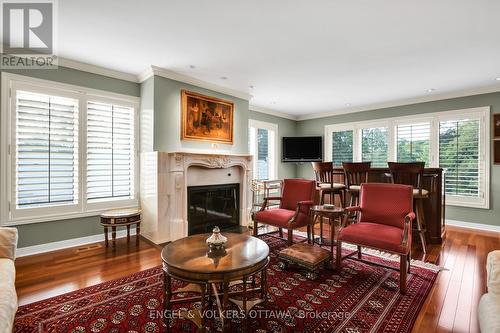 1 - 65 Whitemarl Drive, Ottawa, ON - Indoor Photo Showing Living Room With Fireplace