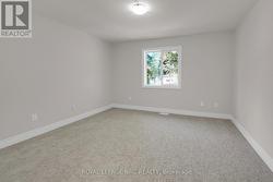 FIRST BEDROOM UPSTAIRS - 