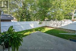 VIEW OF BACKYARD FROM BACK PORCH - 