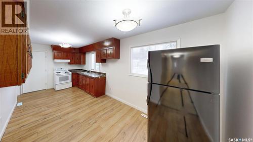2130 Atkinson Street, Regina, SK - Indoor Photo Showing Kitchen With Double Sink