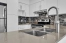 Kitchen - 205-191 Av. Brock S., Montréal-Ouest, QC  - Indoor Photo Showing Kitchen With Double Sink With Upgraded Kitchen 