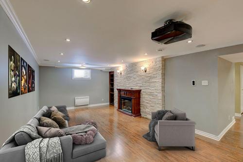 Cinéma maison - 26 White Pine Drive, Beaconsfield, QC - Indoor With Fireplace