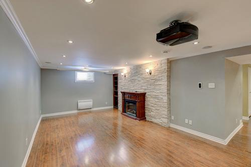 Sous-sol - 26 White Pine Drive, Beaconsfield, QC - Indoor With Fireplace