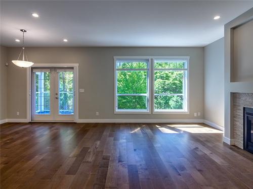 118-1675 Penticton Avenue, Penticton, BC - Indoor With Fireplace