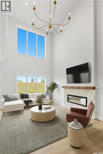 413 Traeger Close, Saskatoon, SK - Indoor Photo Showing Living Room With Fireplace