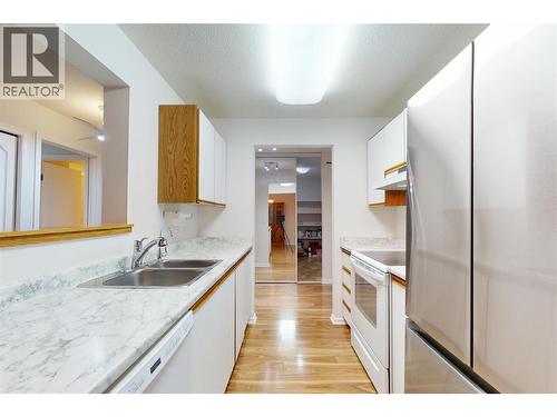 780 Houghton Road Unit# 201, Kelowna, BC - Indoor Photo Showing Kitchen With Double Sink