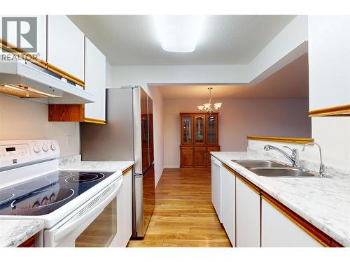 780 Houghton Road Unit# 201, Kelowna, BC - Indoor Photo Showing Kitchen With Double Sink