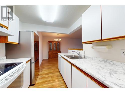 780 Houghton Road Unit# 201, Kelowna, BC - Indoor Photo Showing Kitchen With Double Sink