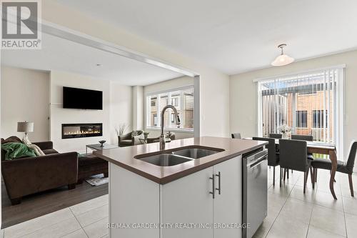 111 Sunflower Crescent, Thorold (Hurricane/Merrittville), ON - Indoor Photo Showing Kitchen With Fireplace With Double Sink